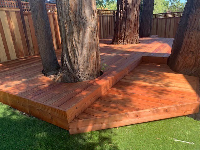 Completed wood fence project by Meza